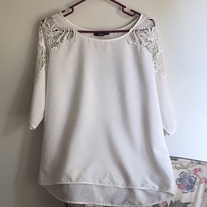 Ivory polyester top with beautiful crochet detail